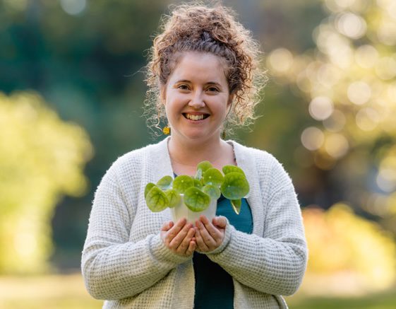 charity plant Charity outside holding plant